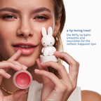 Miffy Lip Balm — model applying pink lip balm with the open Miffy jar