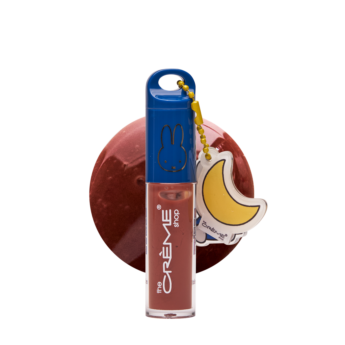 Miffy Tinted Lip Oil — Cocoa Cutie — brown lip oil tube with blue cap and banana keychain charm with a matching color swatch