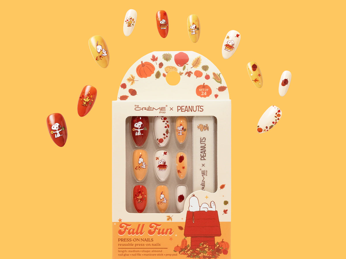 Peanuts Fall Fun press-on nail set with autumn-themed Snoopy designs.