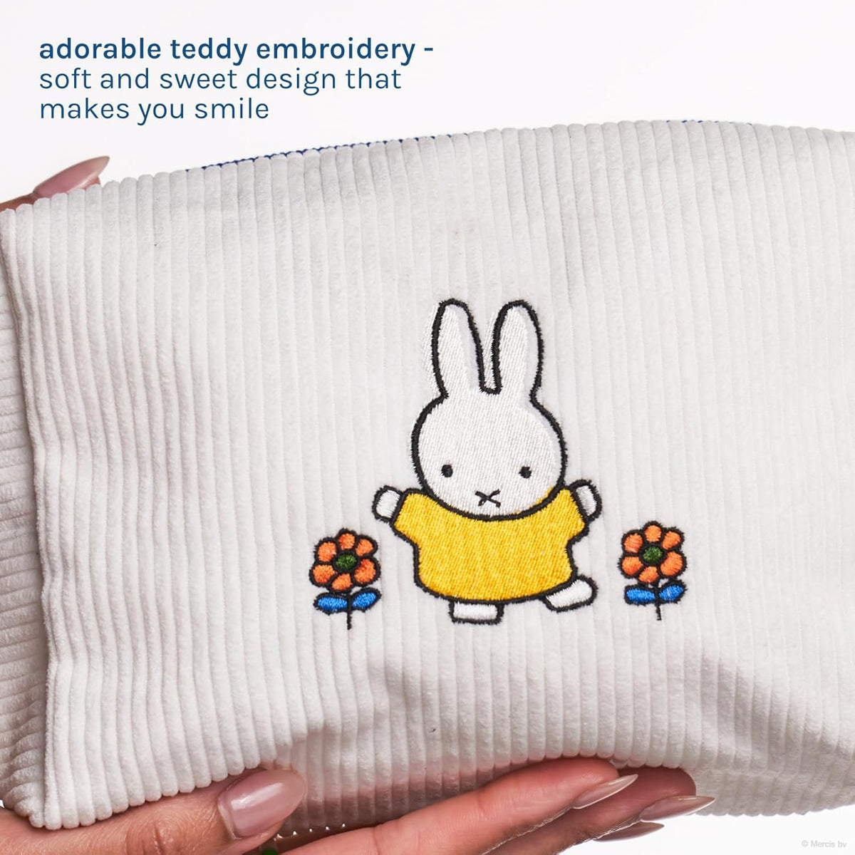Miffy Perfect Travel Makeup Bag — close-up of embroidered Miffy and flowers on the white bag