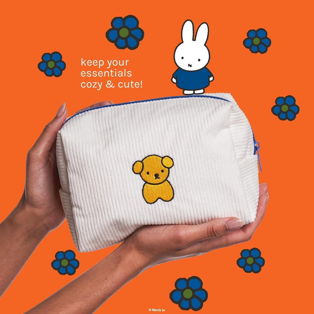 Miffy Perfect Travel Makeup Bag — hands holding the bag with yellow bear embroidery on the back