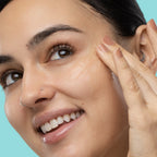 Hydration Station Sleeping Mask Variety Pack — model massaging sleeping mask into her cheek